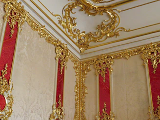 Interior renovation project with red and gold design features being installed