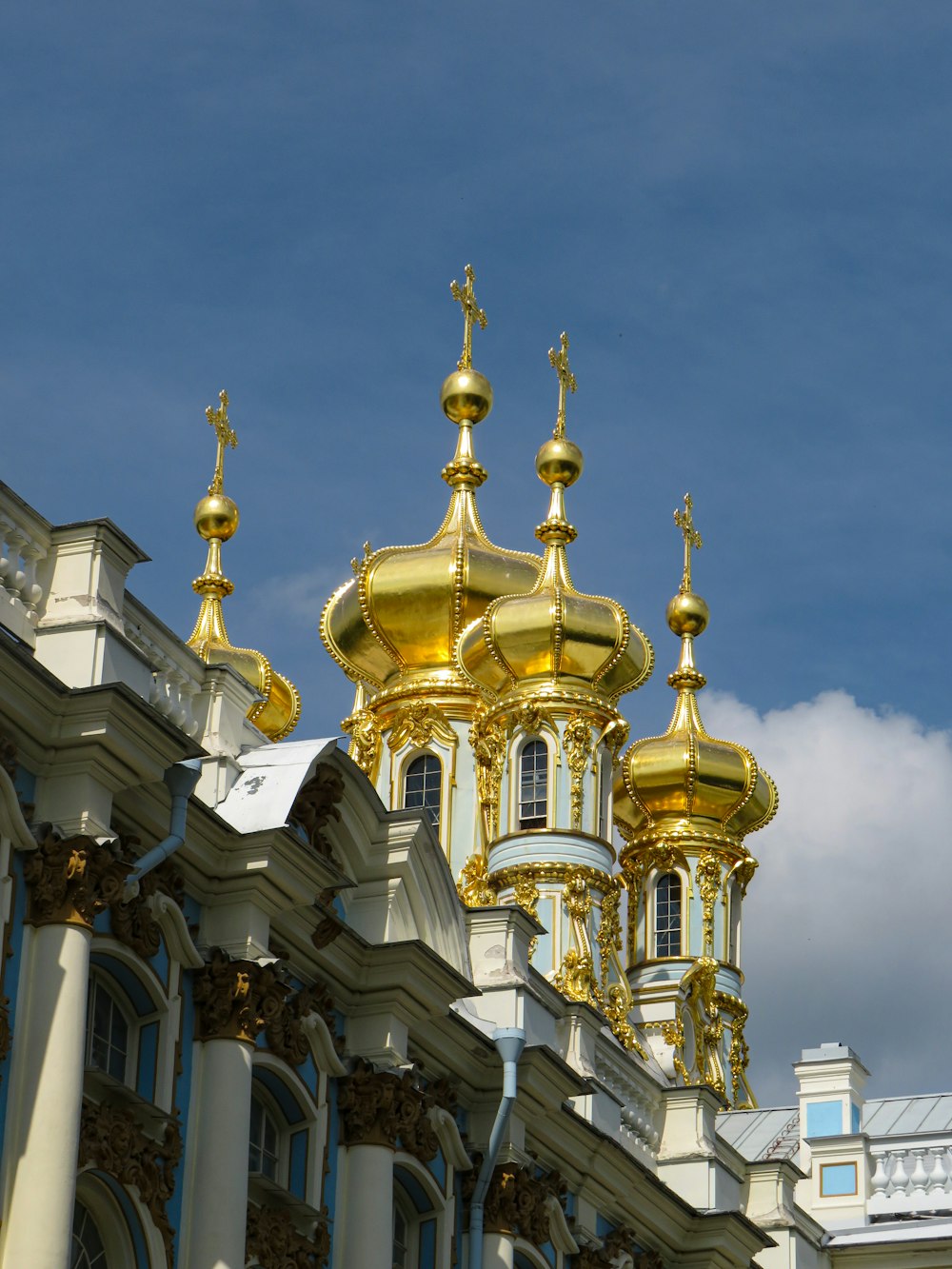 a large building with a gold dome on top of it