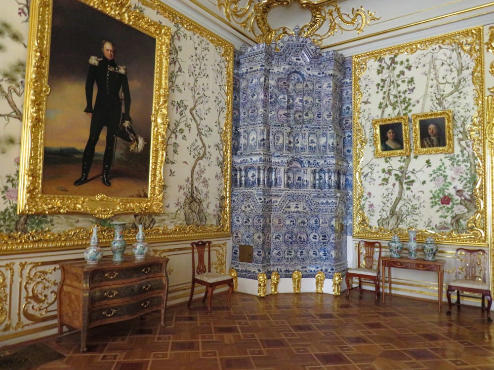 a room with a large painting on the wall