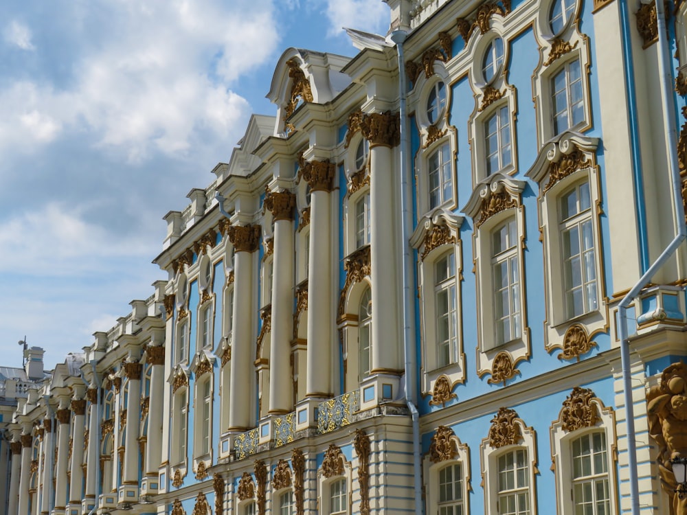 a row of ornate blue and white buildings