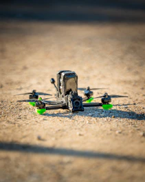 a close up of a remote control helicopter on the ground