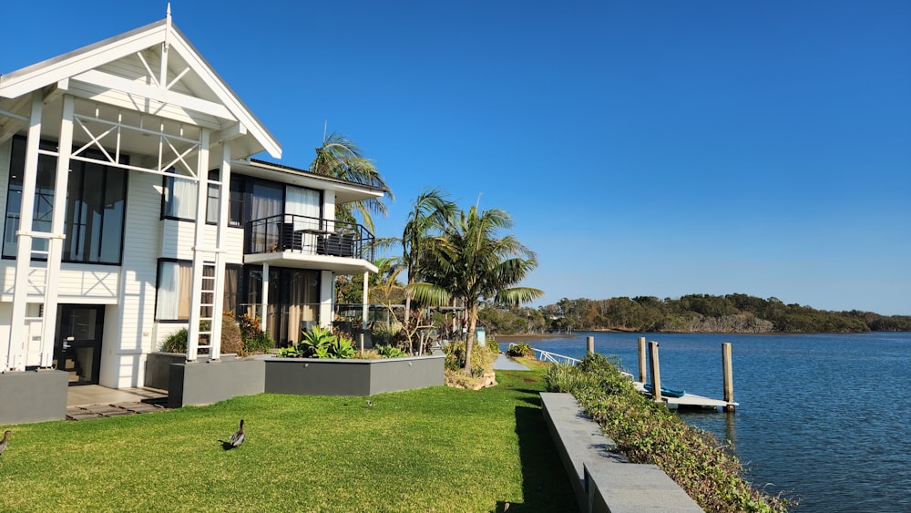 a house on the shore of a body of water