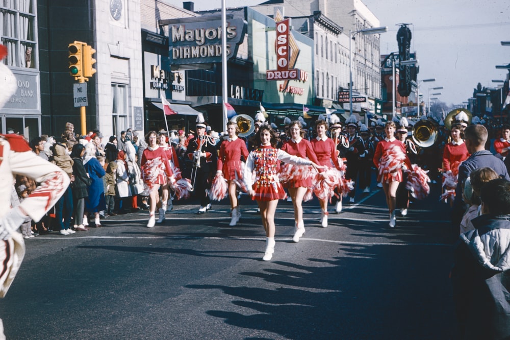 a group of people that are standing in the street