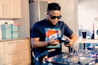 Sala Frias founder adjusting equipment, surrounded by gear from California.