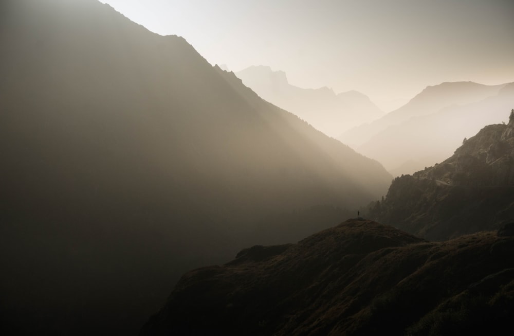 a person standing on top of a mountain