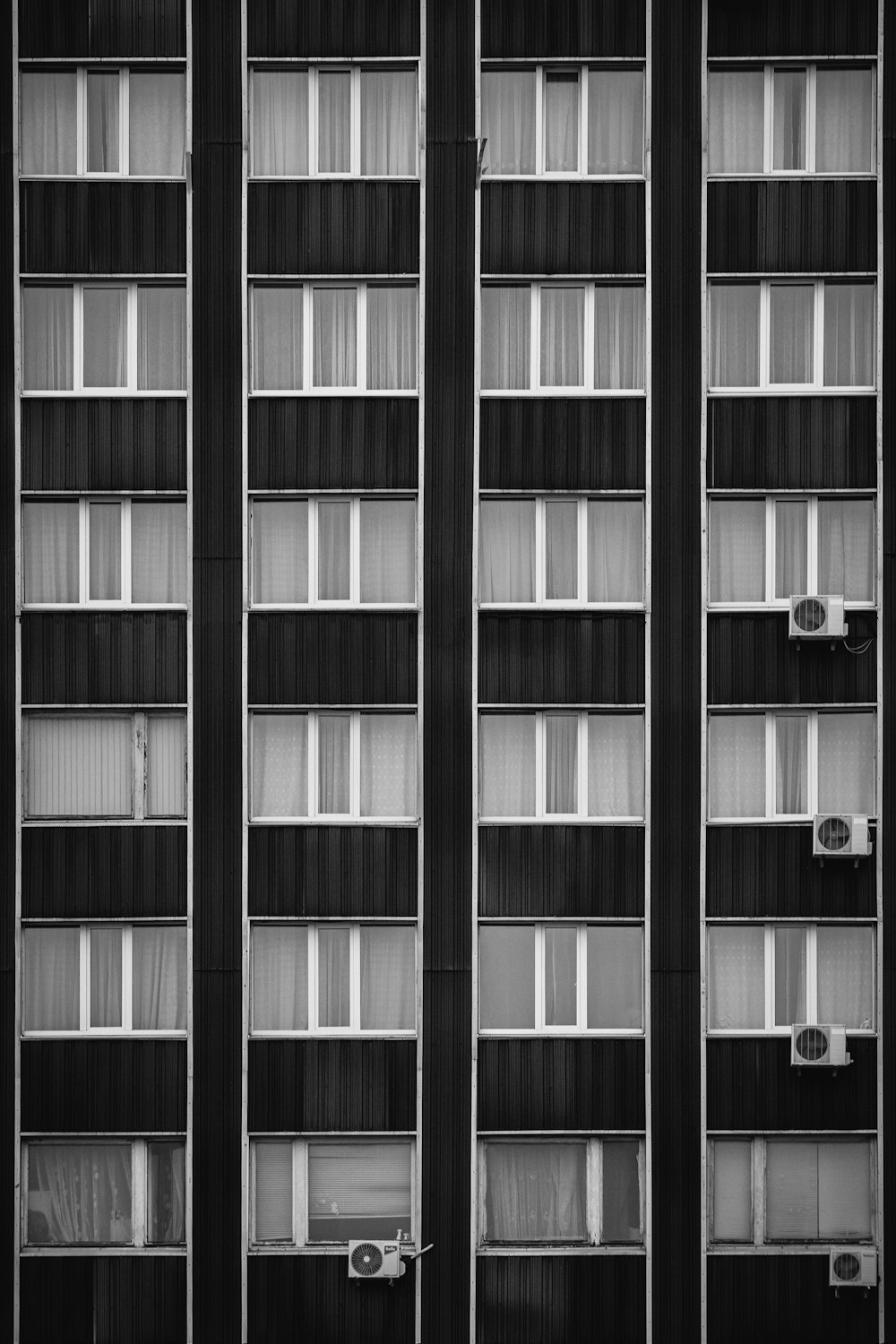 a black and white photo of a tall building