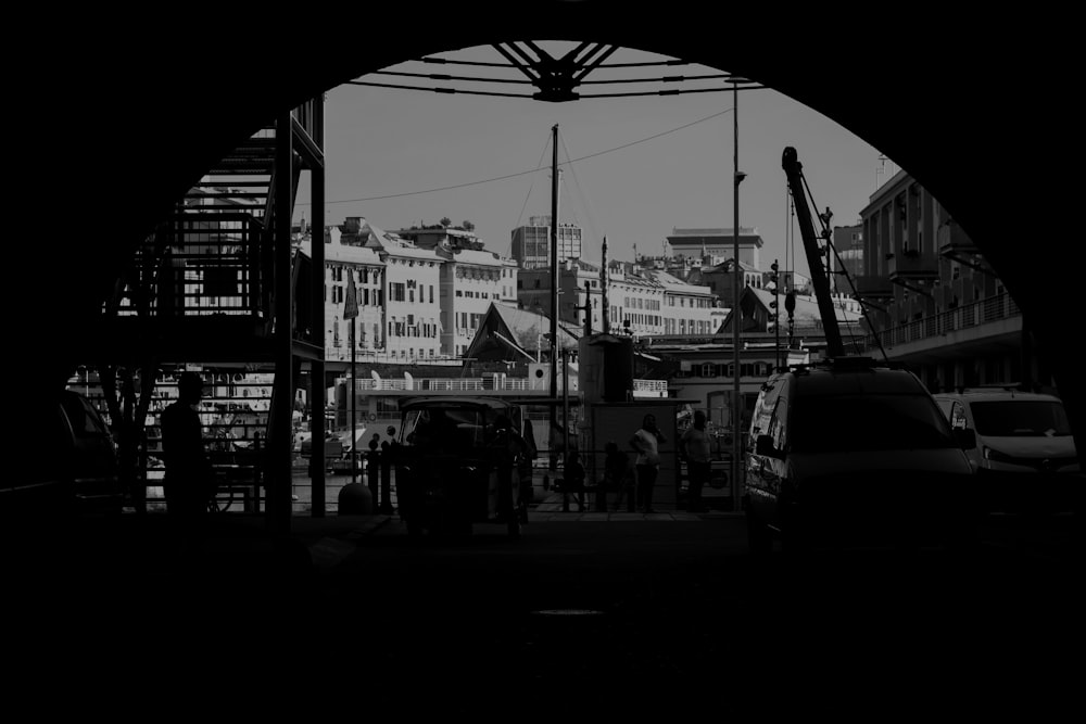 a black and white photo of a train station