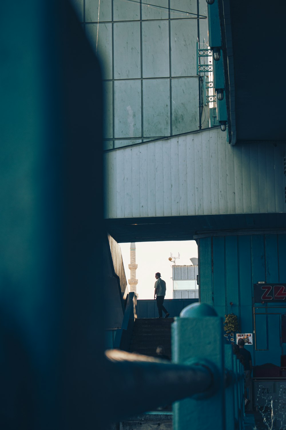 a man walking down a flight of stairs