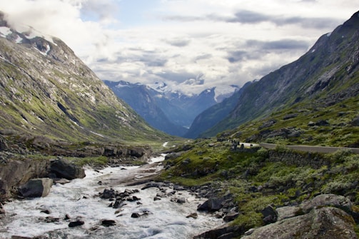 A picturesque mountain landscape with a winding river.