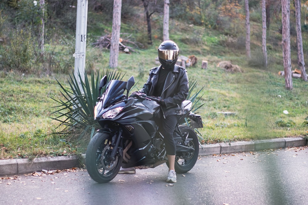 a person on a motorcycle with a helmet on