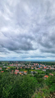 A panoramic view of a village in Maine-et-Loire with various roofs repaired by Mr Couverture.