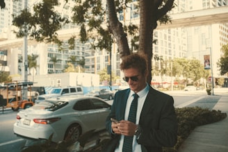 Businessman texting on a phone