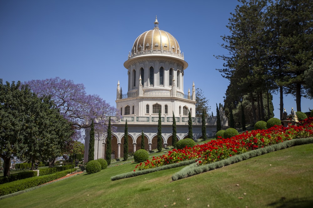 a large white building with a golden dome