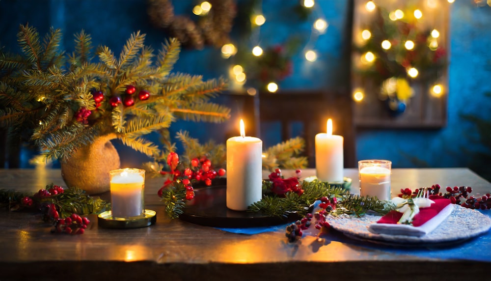 a table topped with candles and a plate of food