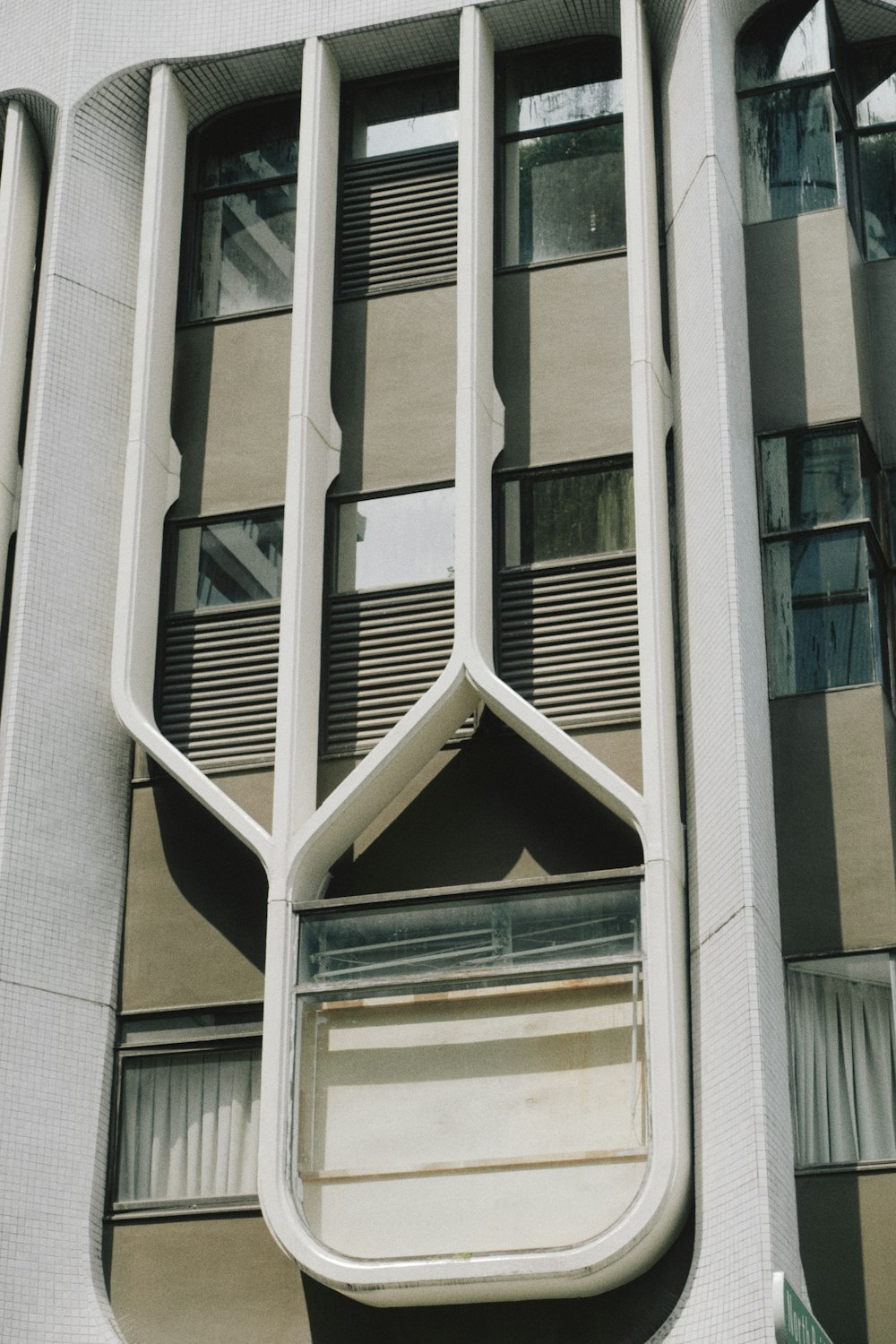 a tall building with a clock on the side of it