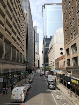 City skyline with service trucks lined up ready for calls.