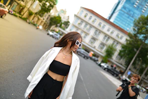 Plus-size woman wearing a casual chic jacket walking in the city