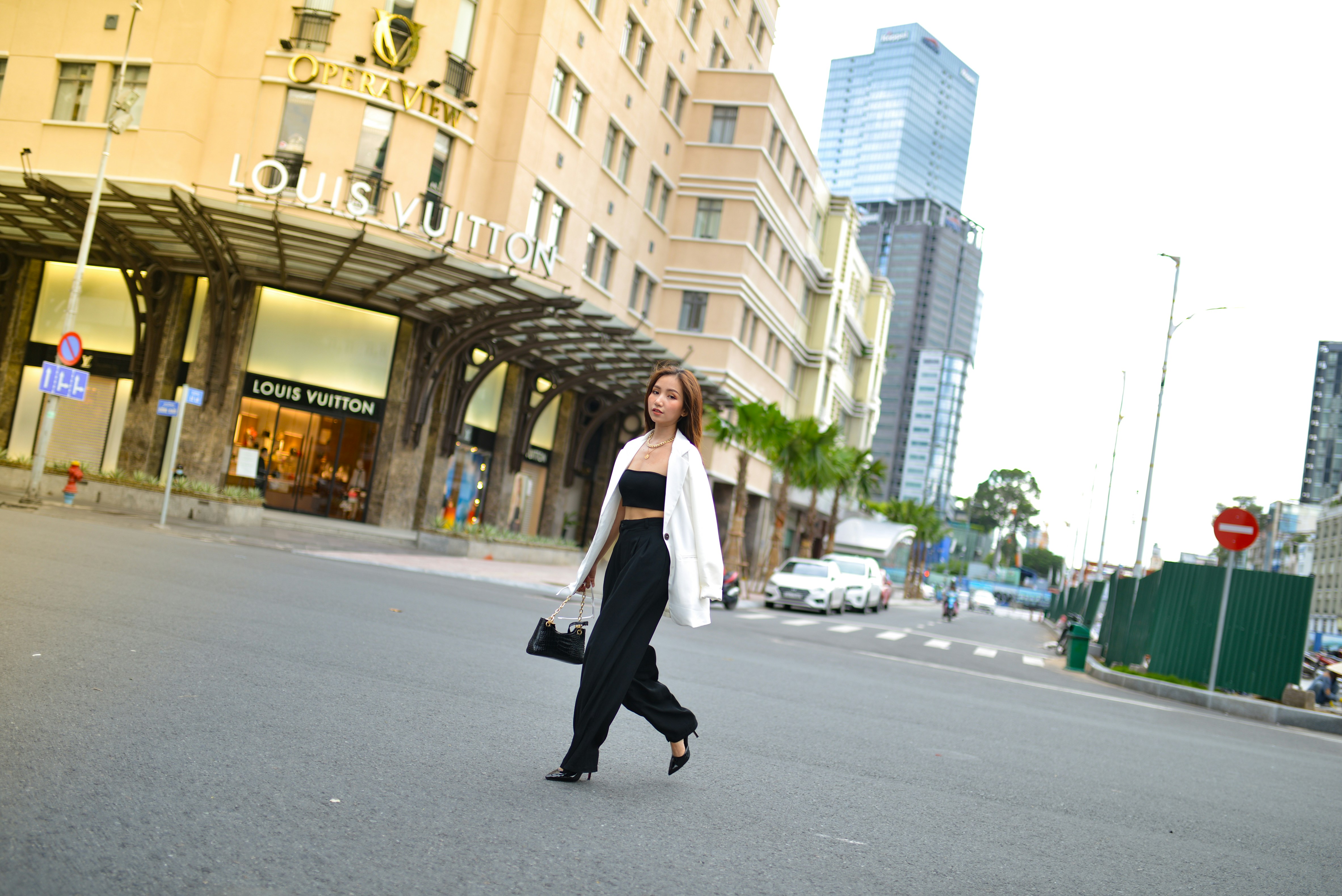 Just strolling through the vibrant streets of Ho Chi Minh City, taking in the beautiful architecture and enjoying the hustle and bustle of this lively city. #outdoor #streetfashion #citylife