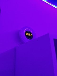 a clock that is on the side of a wall