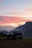 A close-up of a car parked against a beautiful landscape in Arunachal Pradesh.