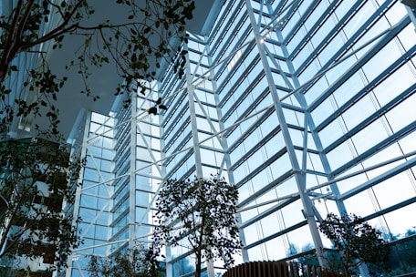 A beautifully designed open space with natural light and green elements promoting sustainability.