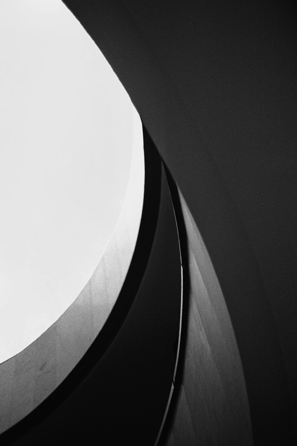 a black and white photo of a clock tower