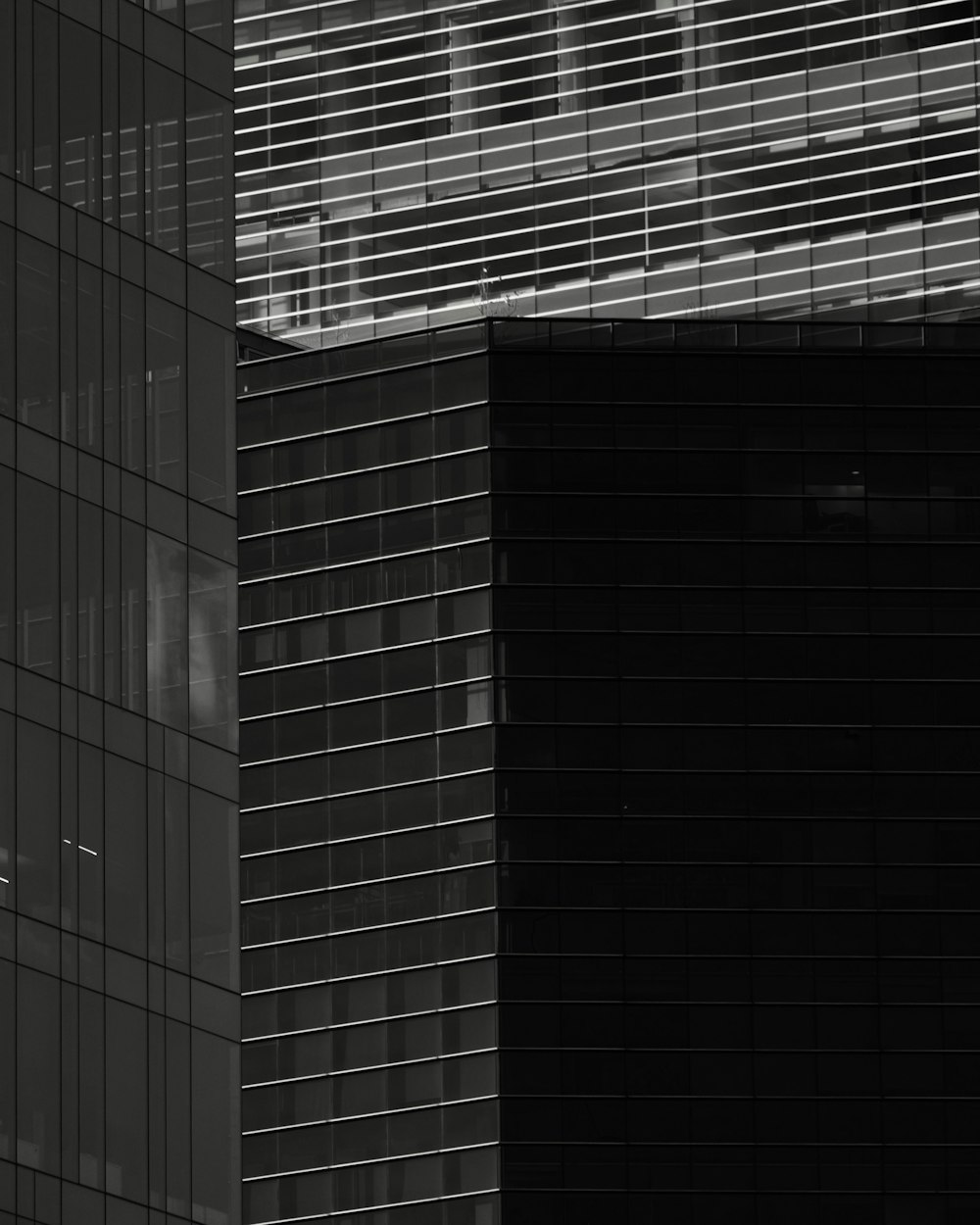 a black and white photo of a skyscraper