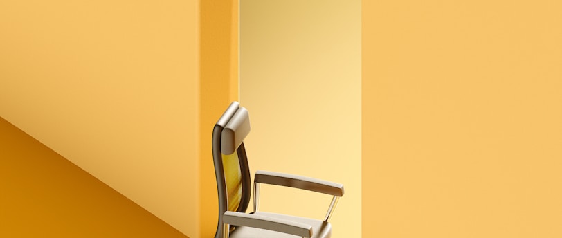 a chair sitting in front of an open door