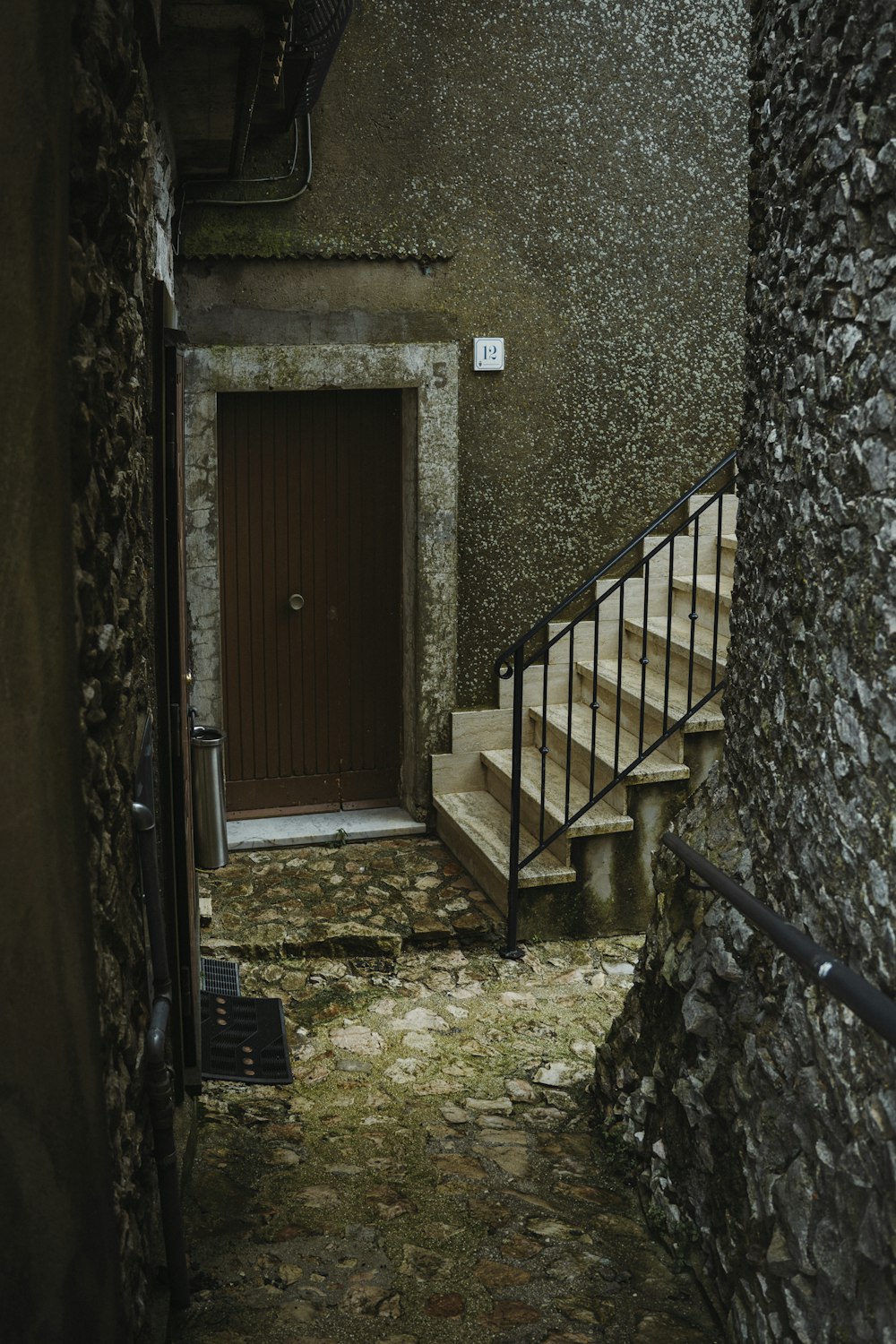 a set of stairs leading up to a door