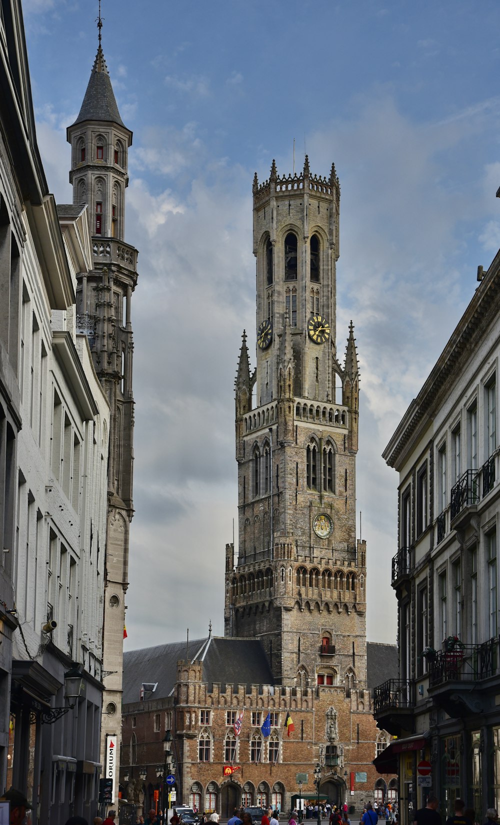 a large clock tower towering over a city