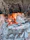 Image of a rustic fireplace mantel crafted from Oklahoma rock.