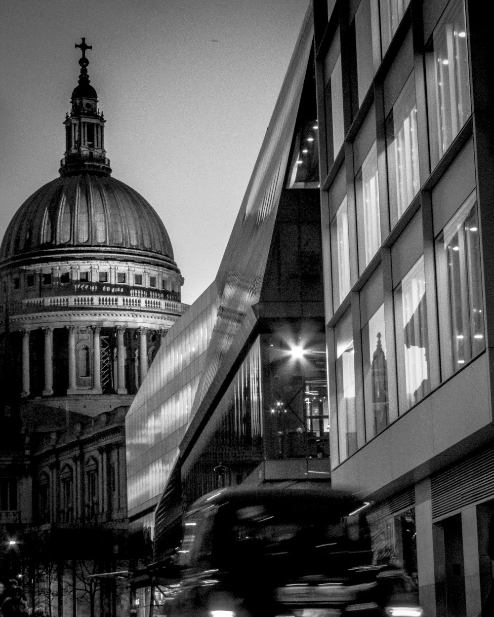 a black and white photo of a building with a dome