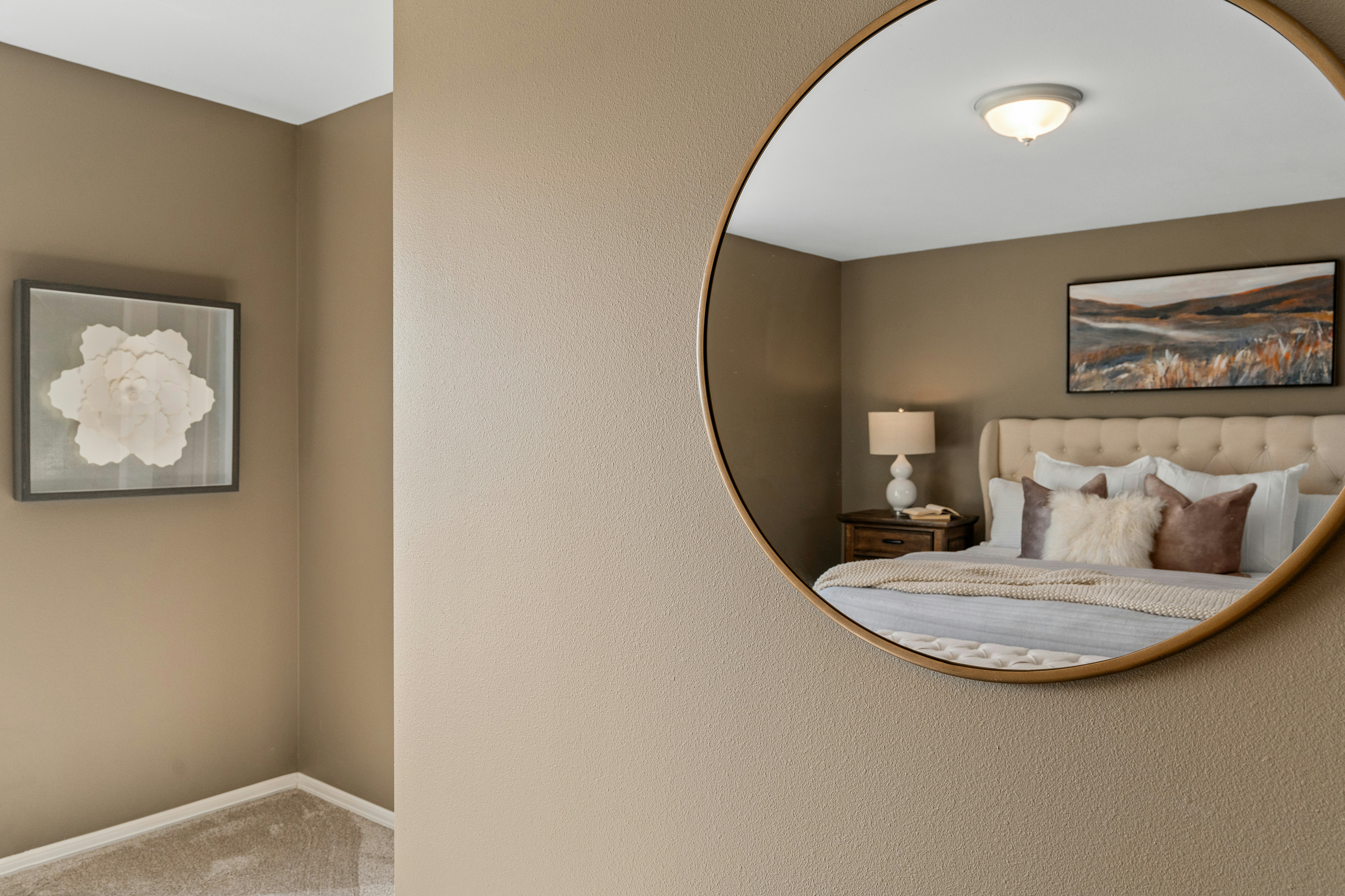 small room using light colors and mirrors to appear larger - 750 sq ft flat