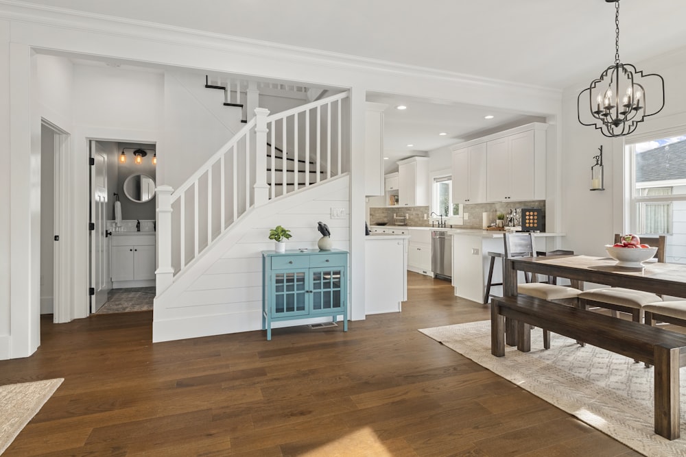 a dining room with a table and a bench