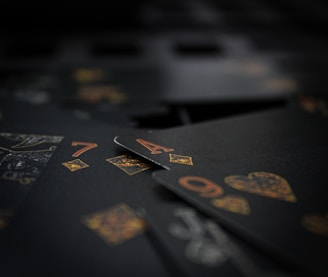 a close up of playing cards with numbers on them