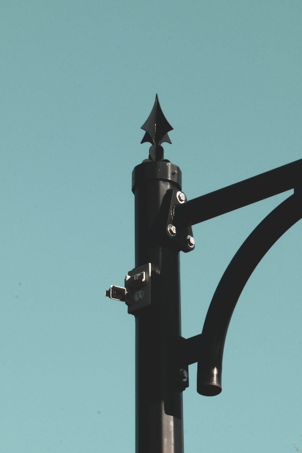 a street light with a star on the top of it