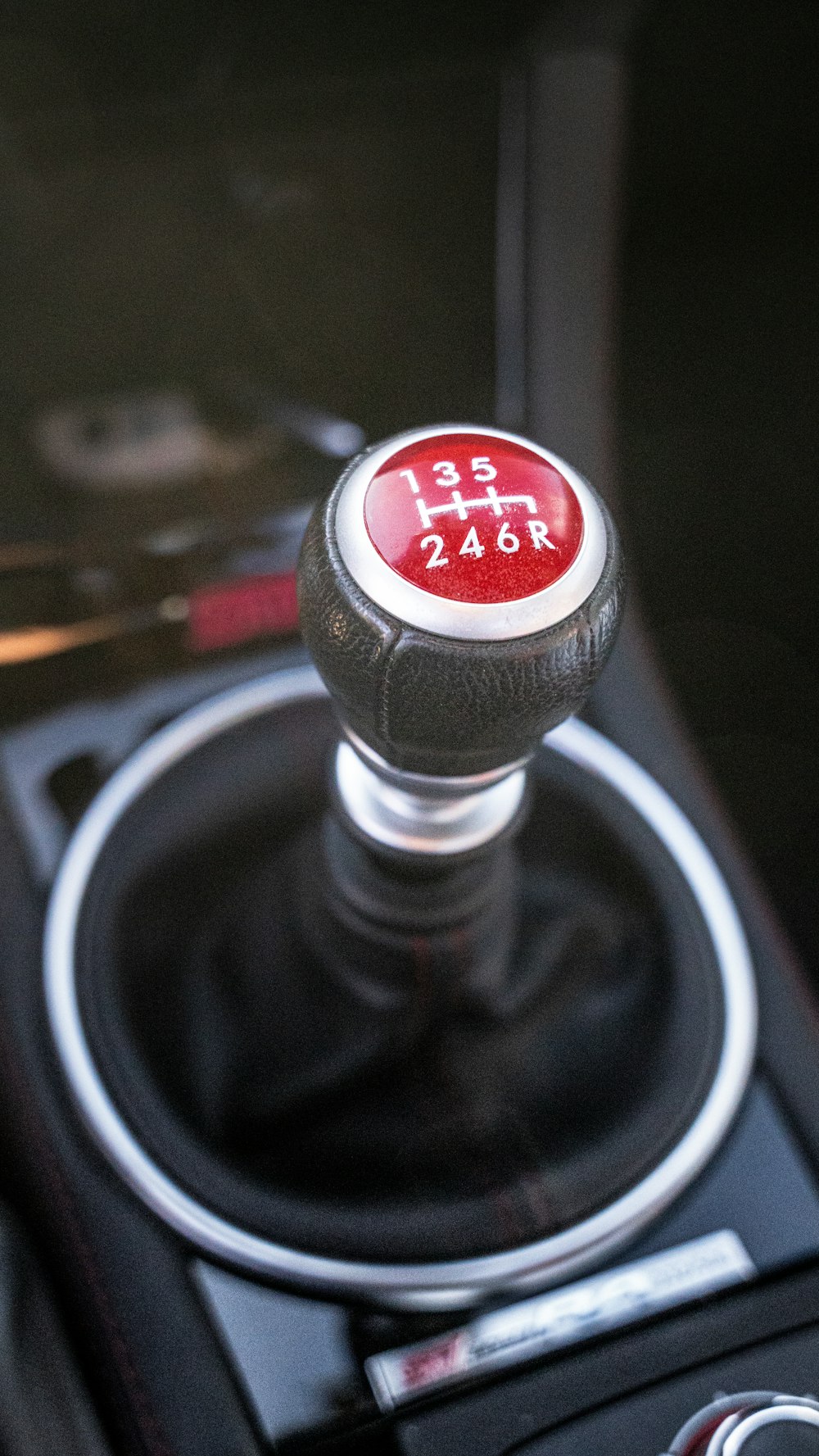 a close up of a button on a steering wheel