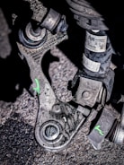 Mechanical parts with compliance checkmarks overlayed.