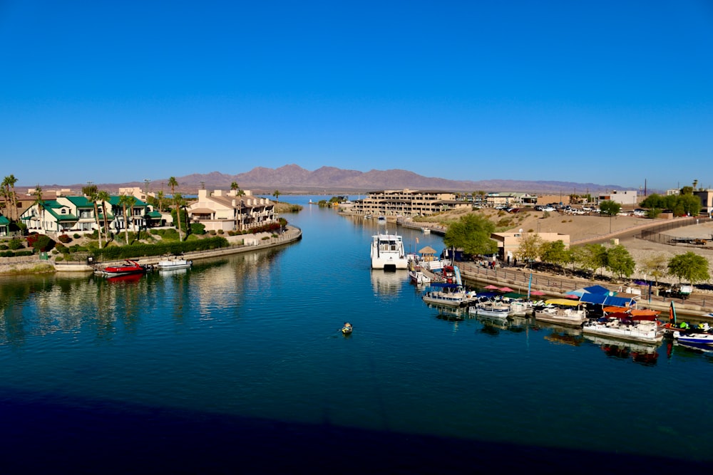 a body of water with a bunch of boats in it