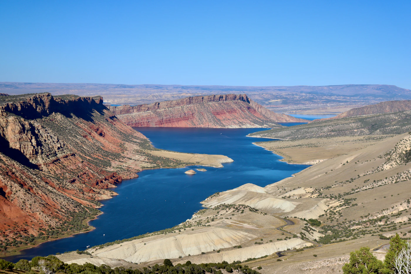 A river canyon winding between desert cliffs in northeastern Utah