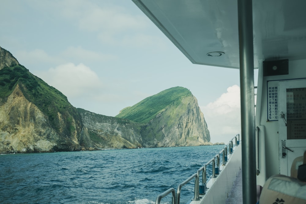 a view of a mountain from a boat on the water