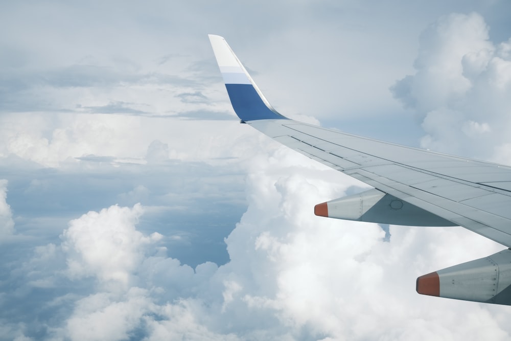 a view of the wing of an airplane in the sky