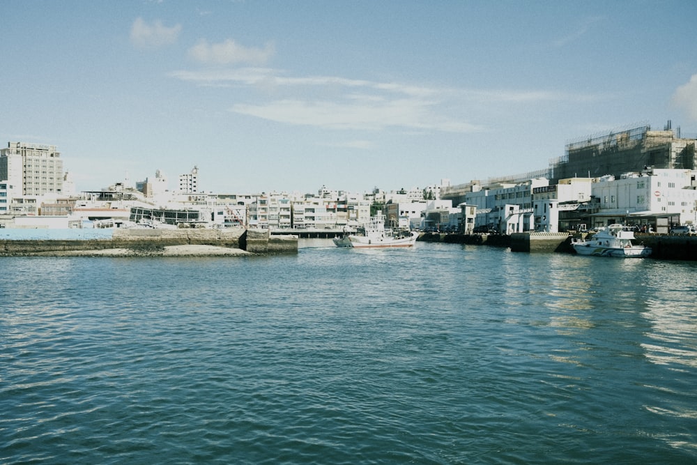 a body of water with a bunch of boats in it