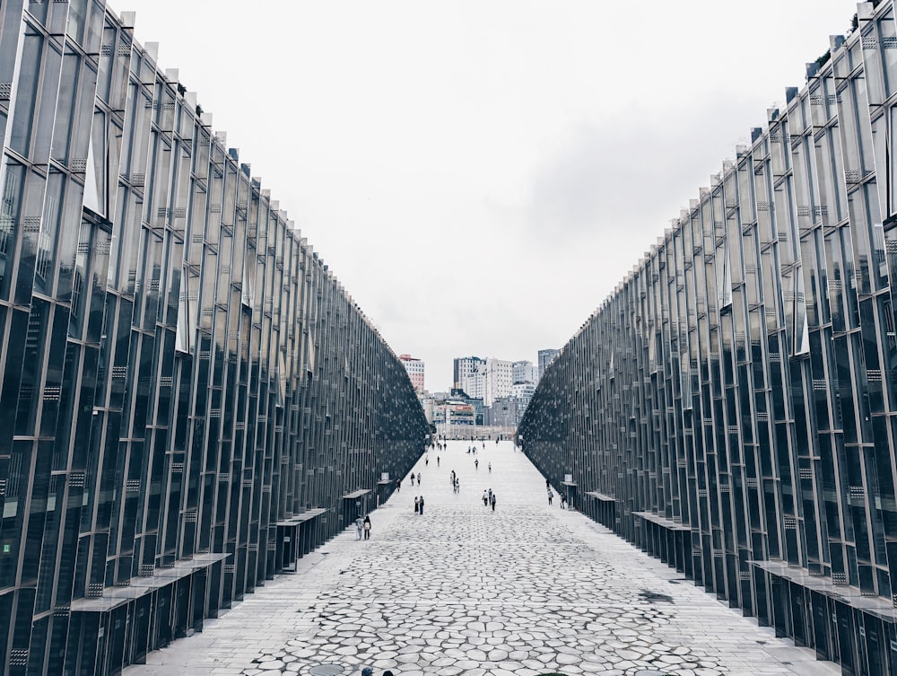 a walkway between two buildings in a city