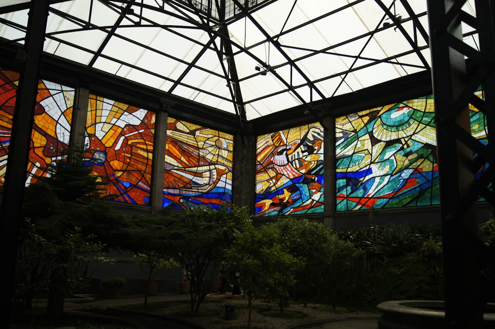 a large stained glass window inside of a building