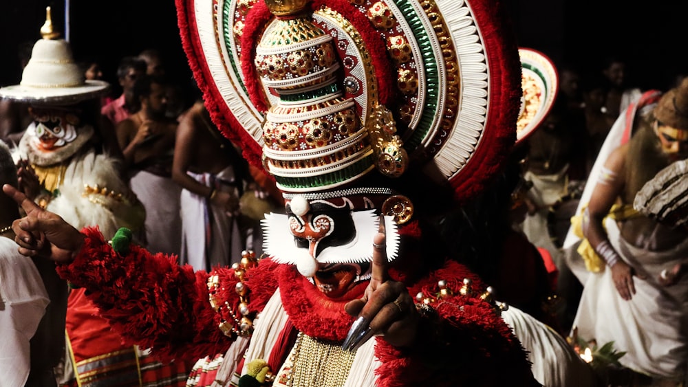 a group of people dressed in costumes and masks