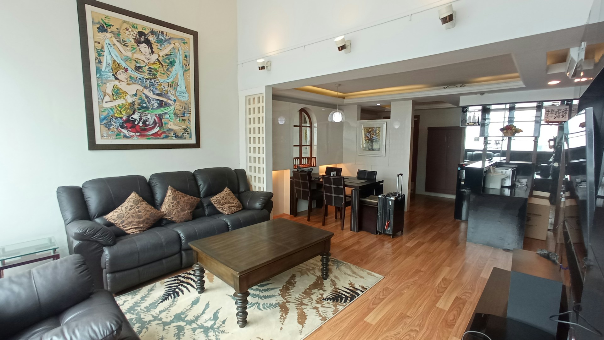 woman wearing yellow long-sleeved dress under white clouds and blue sky during daytime