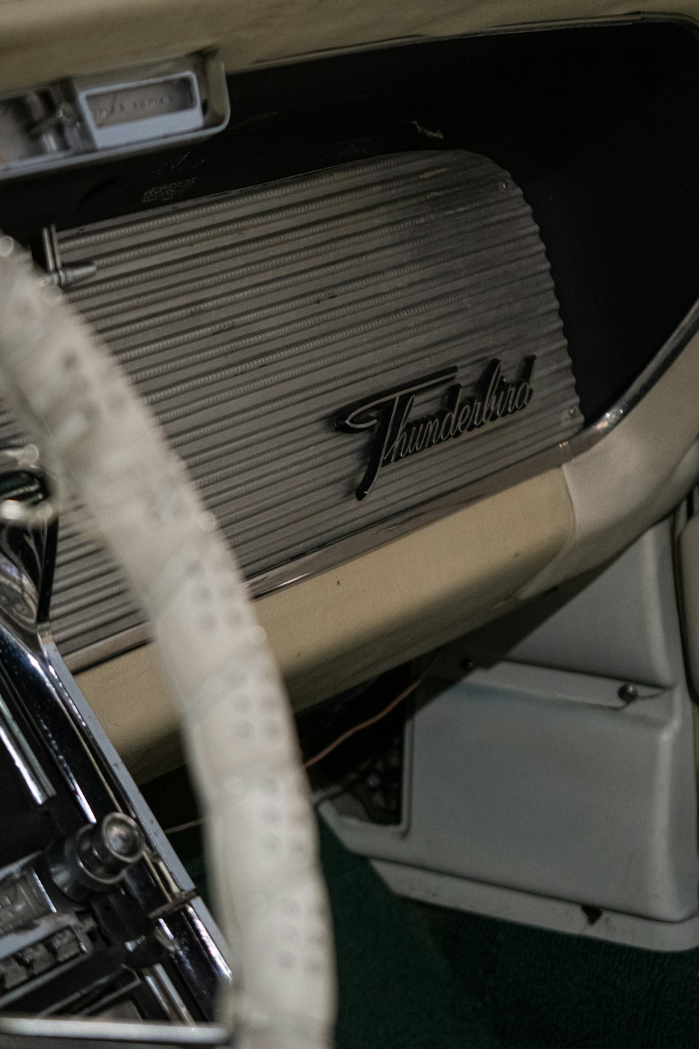 a close up of a car dashboard with a steering wheel