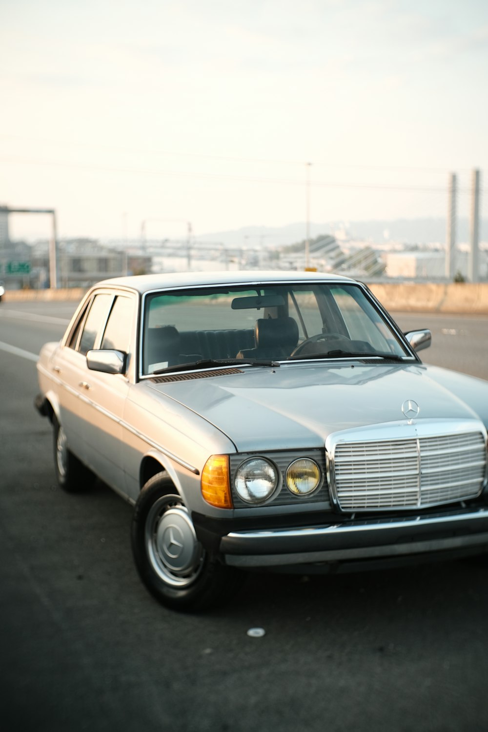 a mercedes benz parked on the side of the road