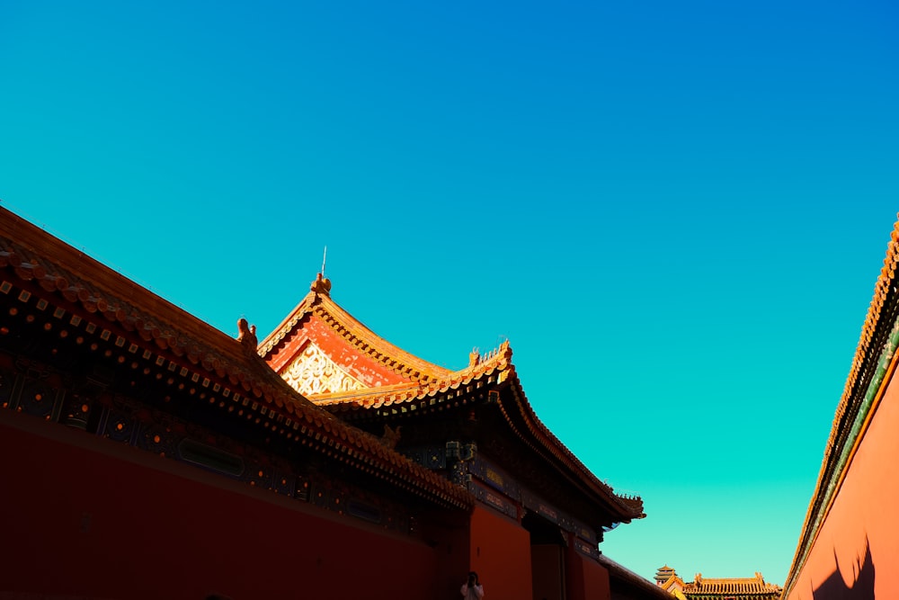 a tall building with a sky in the background